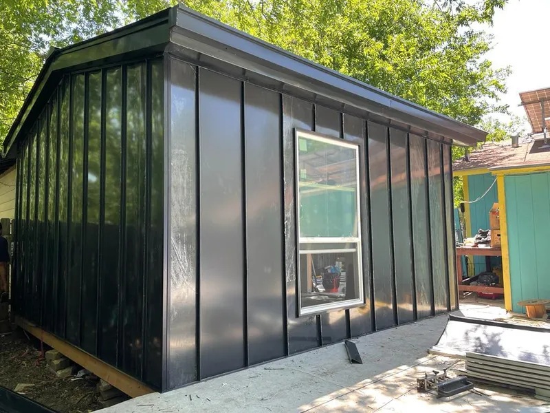 Black standing seam metal wall panels for Metal Roof Installation in Shakopee