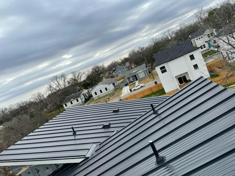 Standing seam metal roof panels with vents for Skylight Repair in Shakopee